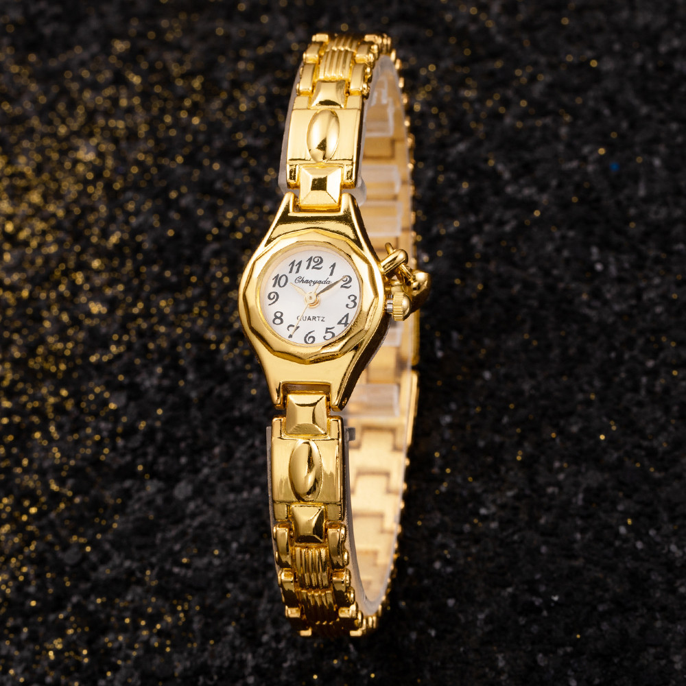Damespolshorloge Gouden armban - Open Heart Watch recensie en prijs